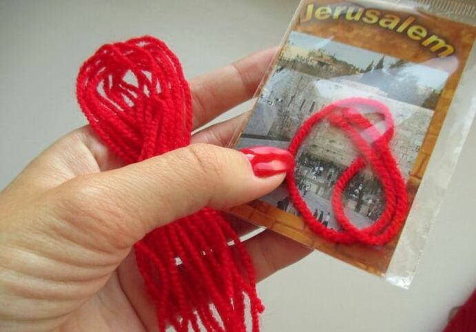 Israeli red thread as a good luck amulet